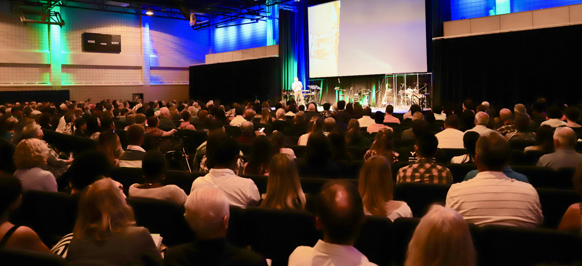 Photo of the auditorium setting where Harvest City messages are delivered