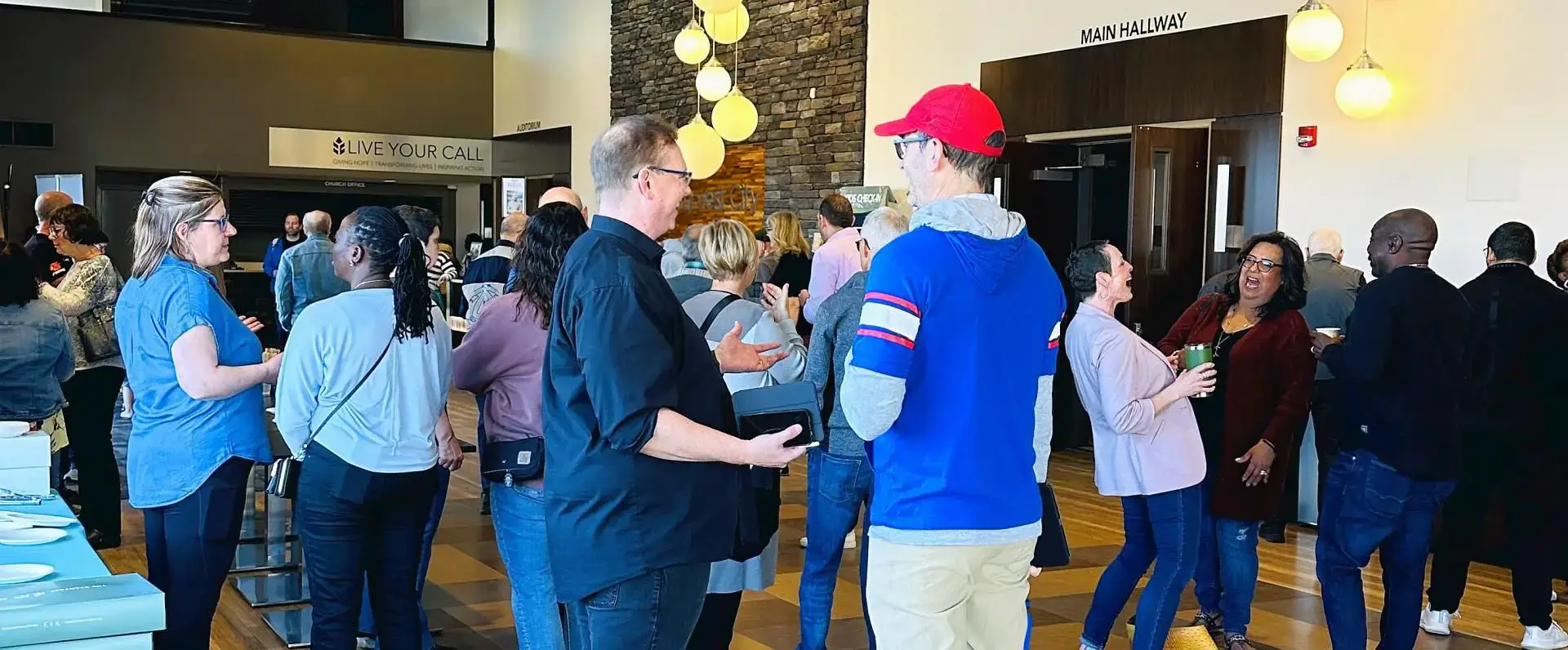 Photo of people enjoying a break at a Harvest City Church event